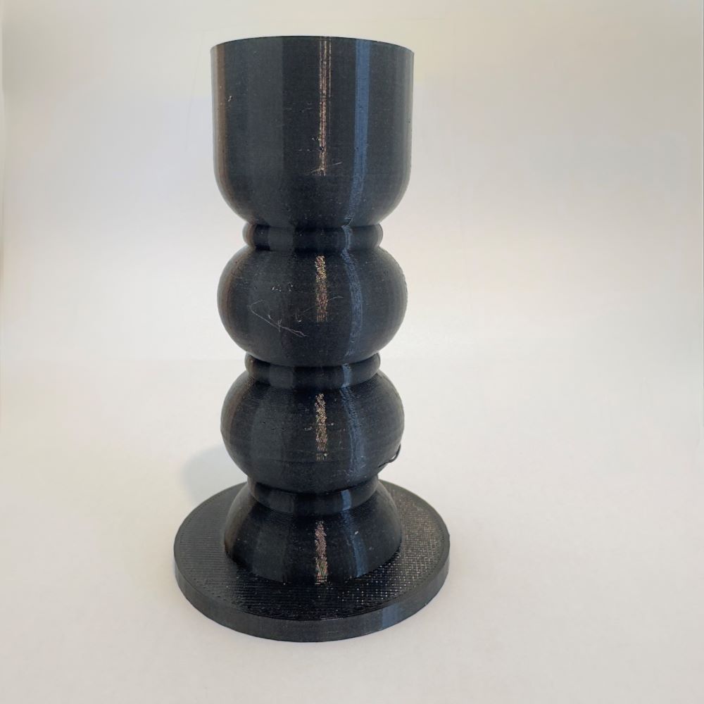 Small custom 3D printed component made from PU (tough rubber), no design services